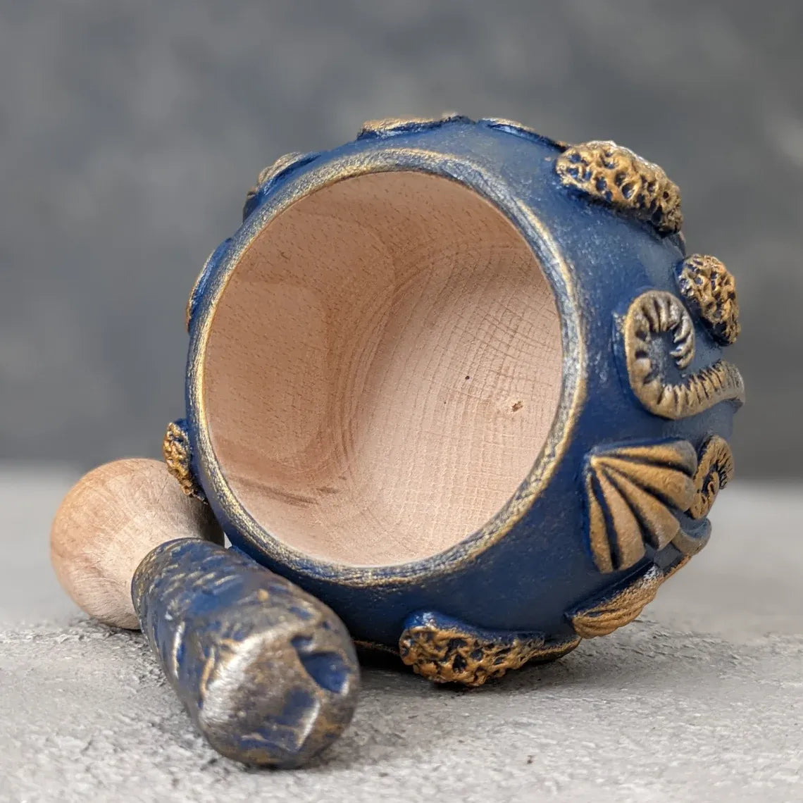 enchanted forest: blue wooden mortar and pestle open