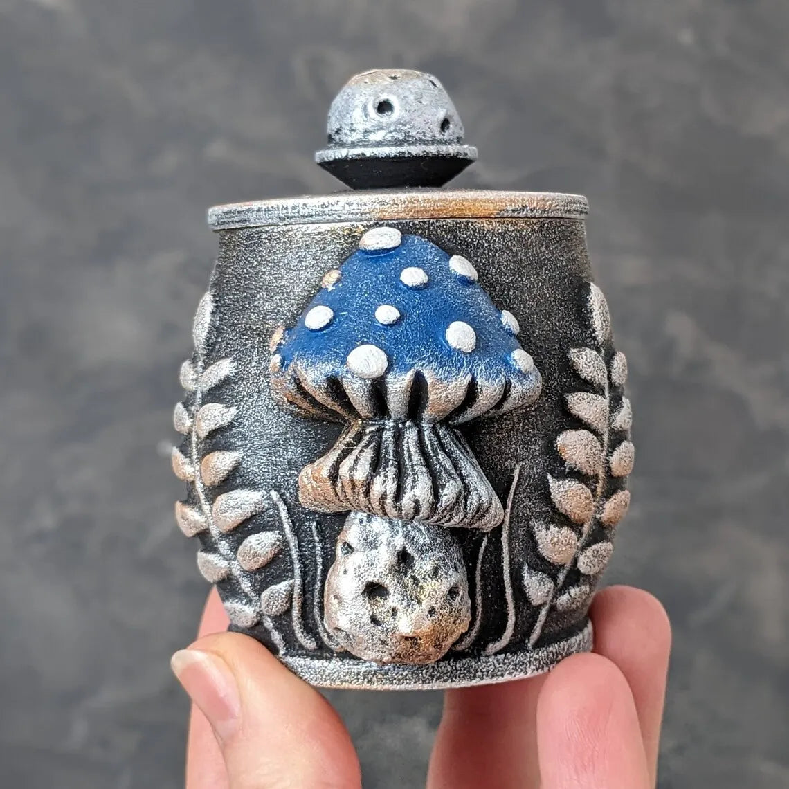 fly agaric mushroom wooden pot with lid in hand blue mushroom