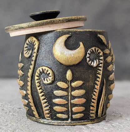 magical herbs under the moon wooden pot  golden black