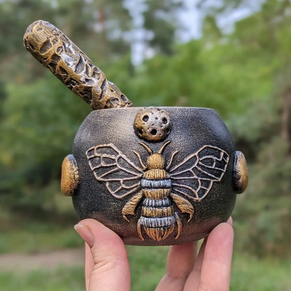 witch bee wooden mortar and pestle in hand 