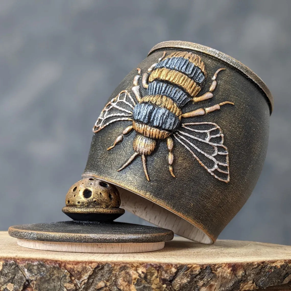 witch bee wooden pot with lid upside down